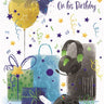 Birthday card for a grandson with balloons, presents, and gaming accessories.