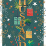 Greeting card with decorative text 'For a very special Husband Happy Birthday' on a teal background.