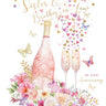 Greeting card with champagne bottle, flowers, and text for a sister and brother-in-law on their anniversary.